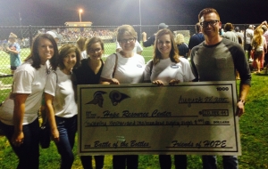 HOPE staff with the check for $20,188.44!!